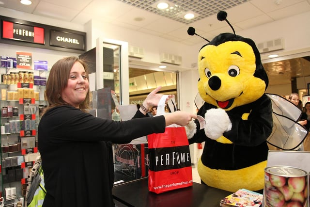 The Four Seasons Mascot picking up some smellies from the Perfume Shop in 2010
