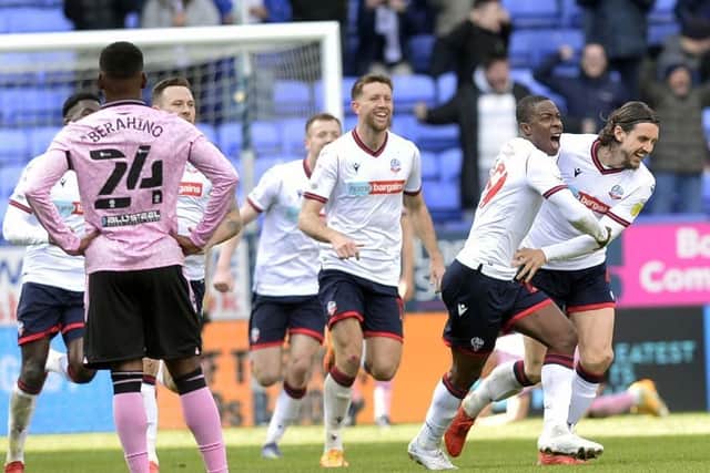 MJ Williams celebrated with his Bolton Wanderers team mates after a late equaliser against Sheffield Wednesday    Pic Steve Ellis