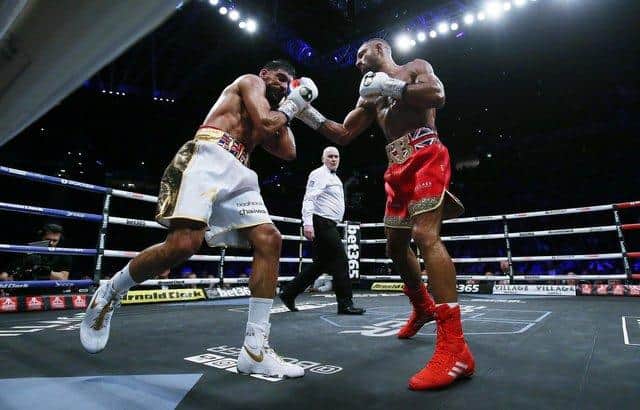 Kell Brook and Amir Khan during last night's much anticipated fight (Photo by Nigel Roddis/Getty Images)