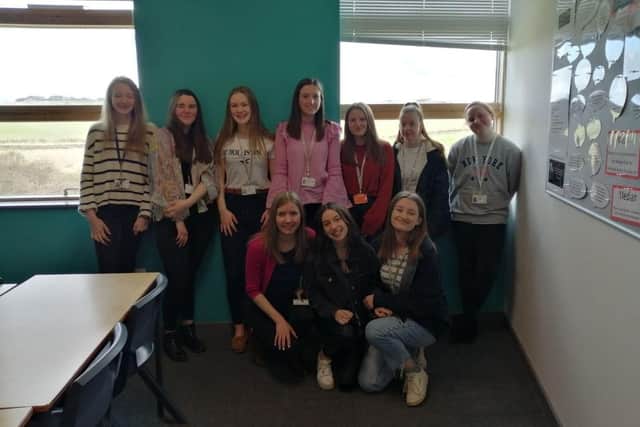 Alice, bottom row left, with friends on the last day of sixth form
