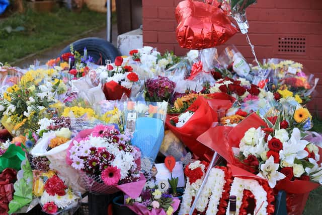 Floral tributes have been left outside a house in Woodthorpe where a man was stabbed to death on Friday, March 6.