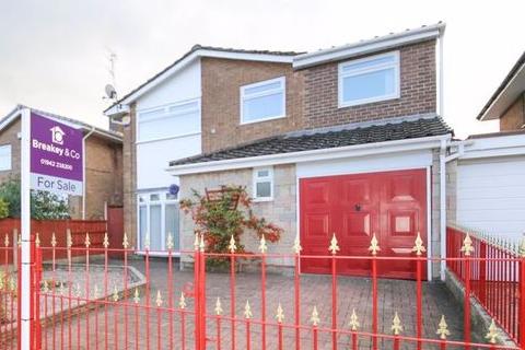 This impressive, four-bedroom, detached home is on the market with Breakey & Co for offers of more than £280,000.