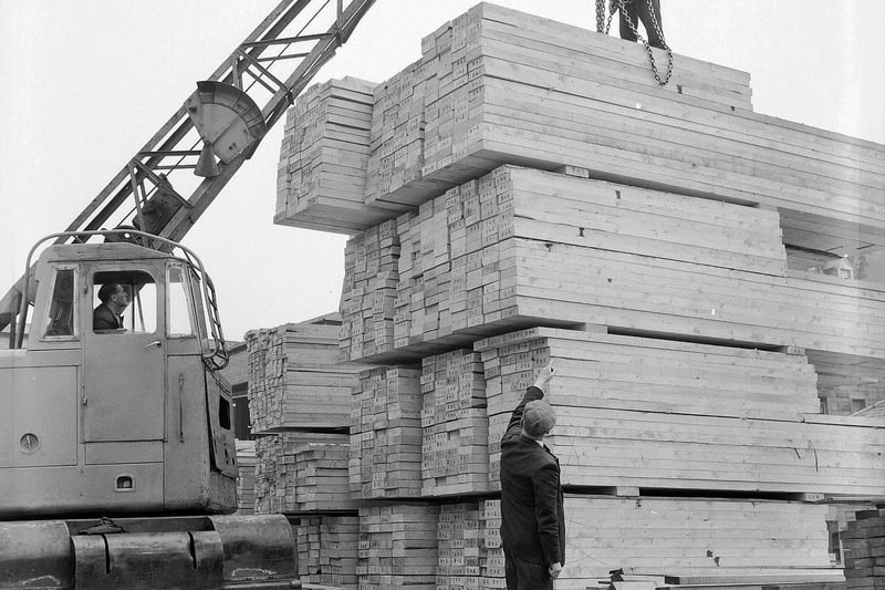 One of the many businesses to operate from Leith Walk in the 1960s was F Mitchell Law Millais and Timber Merchants. Timber from Sweden is pictured being stacked by mobile crane at their headquarters at 234 Leith Walk in May 1960.
