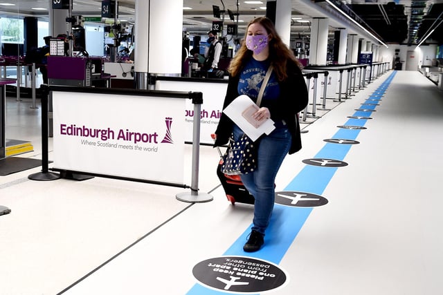 One-way colour coded systems are in place to manage flow and social distance at Edinburgh Airport.