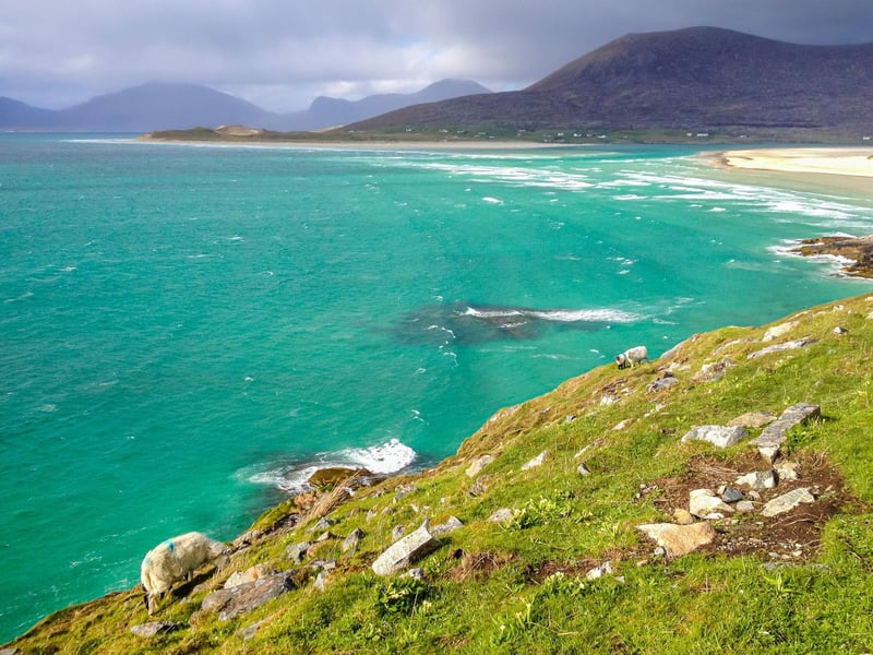 The Isle of Harris is known for its spectacular beaches, like Luskentyre - thought to be one of the best in Scotland. With the clear turquoise waters, white sands, and mountains rising from the sea, you can see why. Harris has inspirational scenery and a strong connection to the arts. You can take a ferry route from Ullapool to Lewis, Harris, and Skye (£20pp).