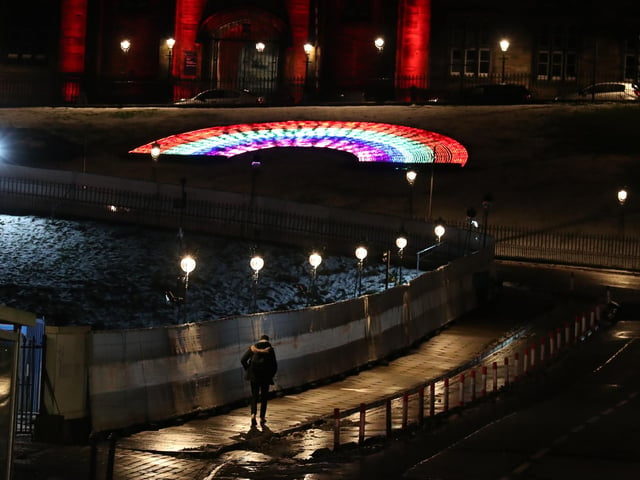 A rainbow remains lit up on the Mound. Photo credit: Andrew Milligan