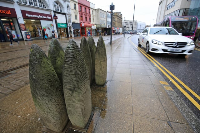 They might look like mere bollards - but these six metre-high pieces of stone are actually a work of public art called the Ali Babas. They were carved by Victoria Brailsford into shapes reminiscent of baskets.