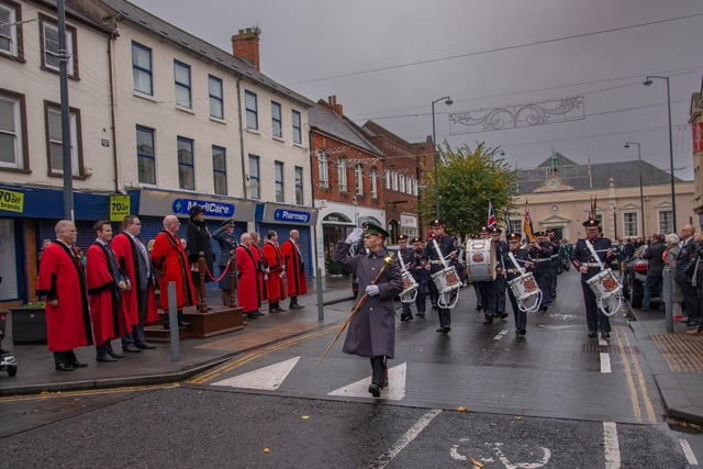 The parade passes along High Street in Carrickfergus.
