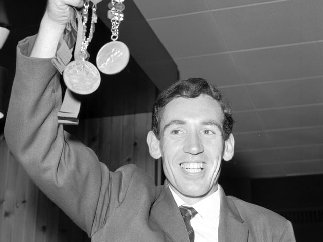 Scotland's Jim Alder displays the medals he won at the 1966 Commonwealth Games in Kingston Jamaica - gold for the Marathon and bronze for the 6 miles