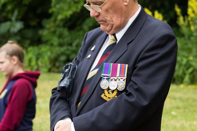 Armed Forces Veteran bows his as a mark of respect  2021