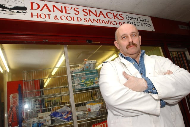 Ken Hopkins pictured outside Dane's Snacks in December 2003. He had been offered £1,200 to quit his shop at Park Hill despite having just invested £14,500 refurbishing.