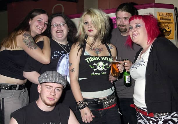 Photo of clubbers having a good time at Subversion in Club EQ, Granada Road, Southsea in 2004. Picture: (044396-0033)