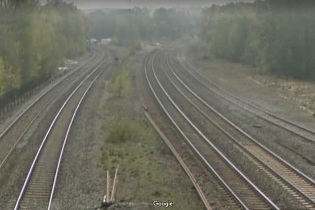 A brick shattered a window of a moving East Midlands Railway train as it neared Sheffield. The picture shows tracks near Clay Cross (picture: Google)