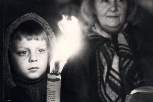 Eight-year-old Jason Oldale and grandma Muriel Oldale of Jaunty Way, Gleadless at the torchlit carol service in Paradise Square December 1978