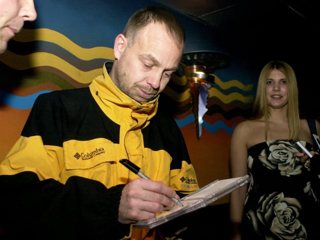 Aussie Star Jason Donovan signing aughtographs for fans before his stage appearence at Karisma Night Club in 2002