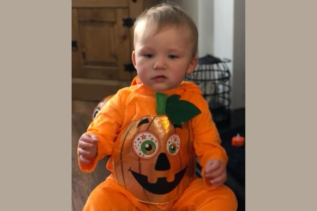 18 month old Michael spent the festivities dressed as a pumpkin.