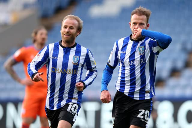 Jordan Rhodes of Sheffield Wednesday celebrates with team mate Barry Bannan after scoring their side's fourth goal during the Sky Bet Championship match between Sheffield Wednesday and Cardiff City at Hillsborough Stadium(Photo by Alex Livesey/Getty Images)