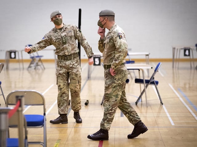 Members of the Royal Scots Dragoon Guard carry out a reconnaissance before setting up a Covid–19 vaccination centre at the Ravenscraig Regional Sports Facility in Motherwell