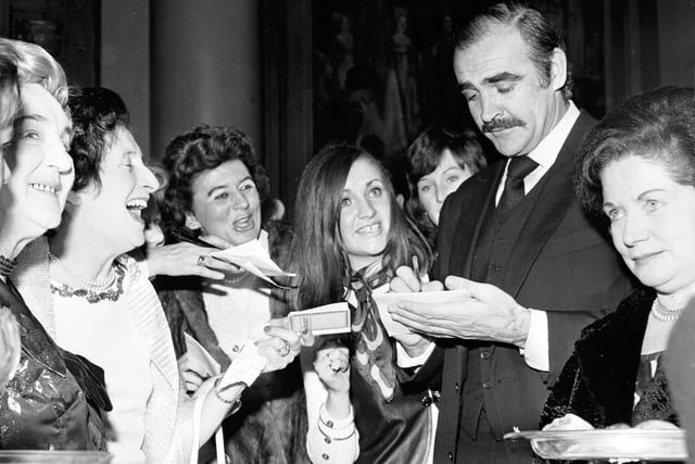 This was taken in January 1972  where he is beseiged by autograph hunters and fans.