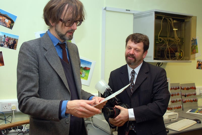 Jarvis Cocker back at City School in 2011 with assistant headmaster Ken Dunn, looking at some early Pulp tickets produced at the school - they played their first gig there in 1980