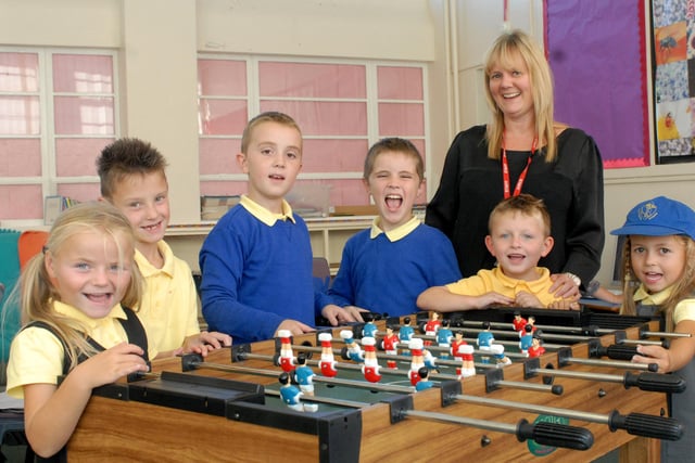Another photo from 2013 and it shows the Lord Blyton School head teacher Jo Atherton with children from the after school club.
