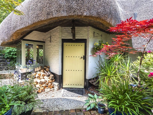 This three bedroom Grade II listed thatched cottage in Nether Wallop is on the market for £900,000. It is listed by Fine and Country.