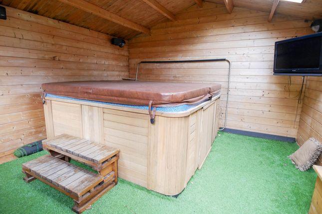 Enjoy your hot tub sessions and your favourite TV programmes at the same time at this five-bedroom semi-detached home. Guide price: £400,000