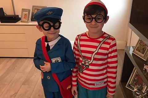 (l) Baylee Wild, 7, went as postman pat while his brother (r) Jayden went as Where's Wally