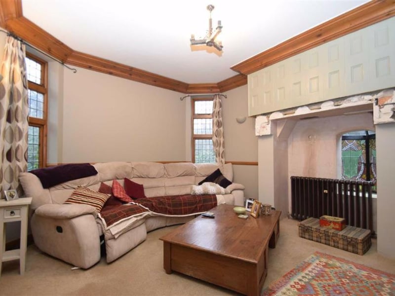 One of the three reception rooms in the former vicarage.