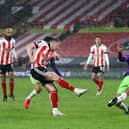 John Lundstram of Sheffield United fires in a shot during the FA Cup match at Bramall Lane, Sheffield: Simon Bellis/Sportimage