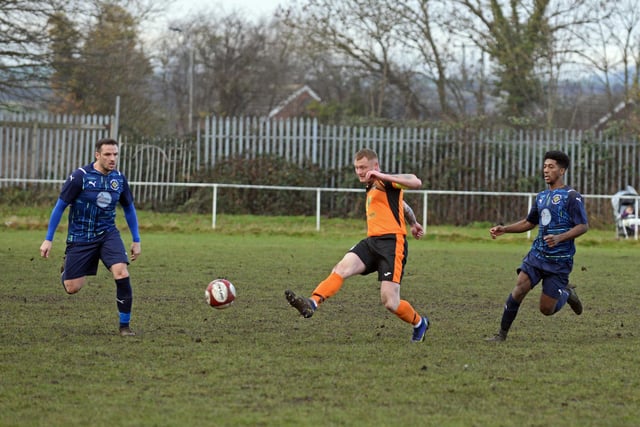 Scawthorpe skipper Gary Mundy keeps possession for his side.