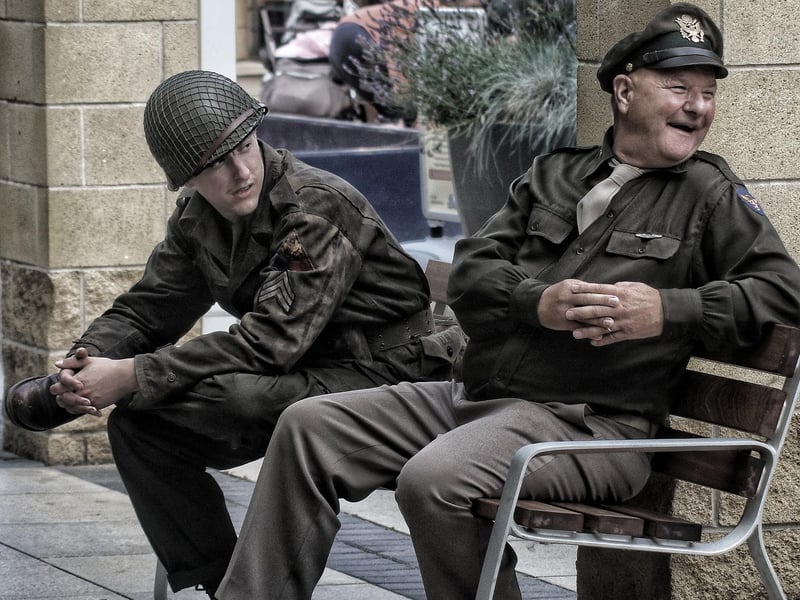 Two men dressed as soldiers.