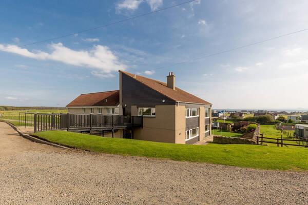 Rear of property with walkway.