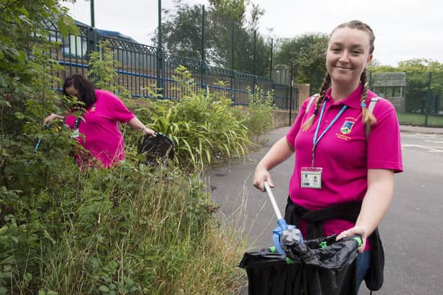 Kerry Wigginton, a volunteer at Watercliffe Meadow Primary School, recycling plastic bottles