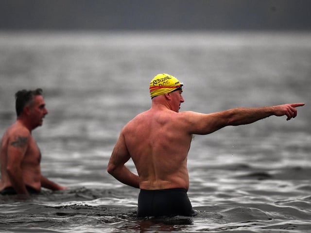 Open water swimming enthusiasts enjoy an early morning swim in Loch Lomond,Trossachs, Scotland. A new study from the UK Dementia Research Institute found that the blood of regular winter swimmers contains a "cold-shock" protein that wasn't found in that of people who did other cold-weather exercise on dry land. This protein has elsewhere been shown to slow the onset of dementia and even repair damage it causes in mice.