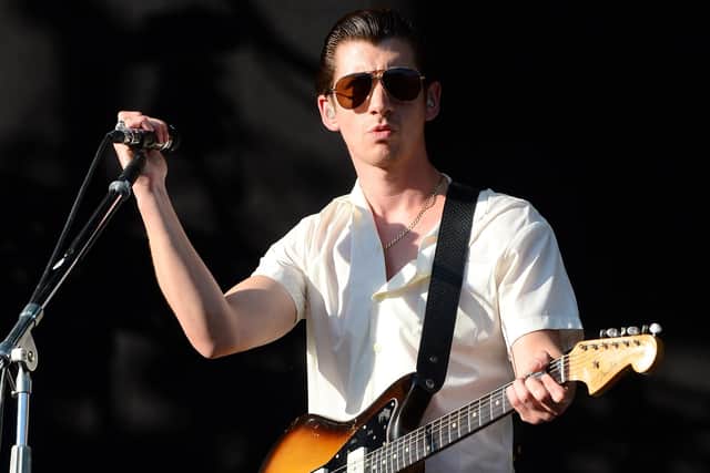 DOVER, DE - JUNE 20:  Alex Turner of Arctic Monkeys performs onstage during day 2 of the Firefly Music Festival on June 20, 2014 in Dover, Delaware.  (Photo by Theo Wargo/Getty Images for Firefly Music Festival)