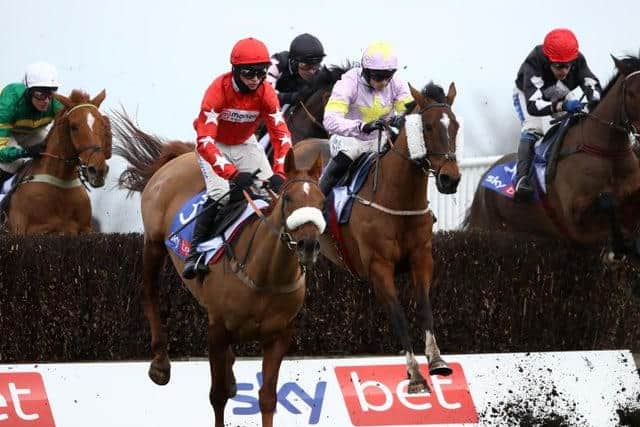 Takingrisks ridden by Sean Quinlan (centre) before going on to win the Sky Bet Handicap Chas at Doncaster.