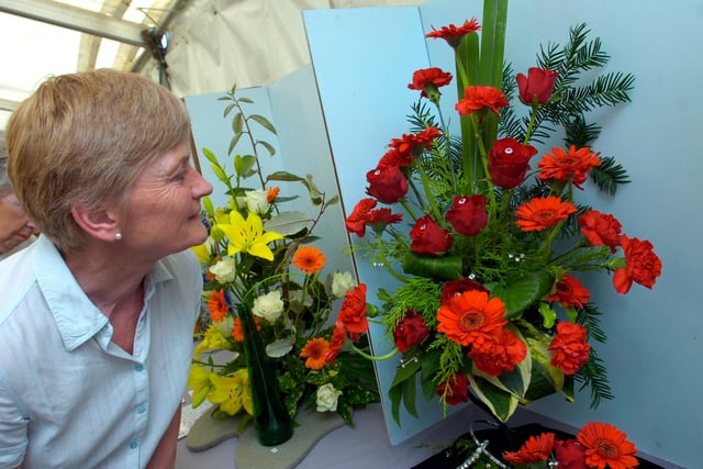 Ruth Oscrpft from Chesterfield enjoys the flower displays at the Dore Show in 2012