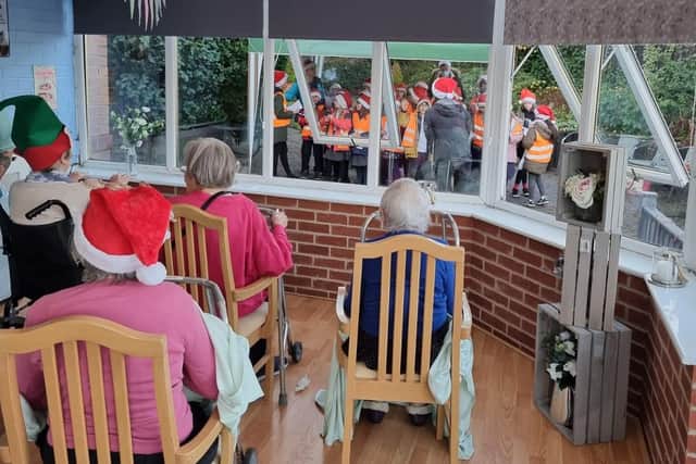 Northfield nursing home residents in Sheffield delighted with Christmas carol visit from Walkley Primary School children
