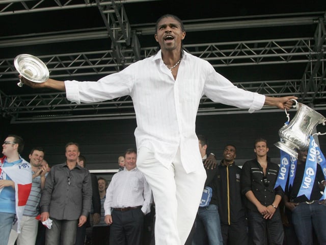 Happy players. Nwankwo Kanu scored the winner in the match as Portsmouth won their first FA Cup in 69 years. Portsmouth players lift the cup on stage at the finale of their victory parade at Southsea Common following their win in the FA Cup Final 2008 on May 18 2008 in Portsmouth, England. Picture: Matt Cardy/Getty Images