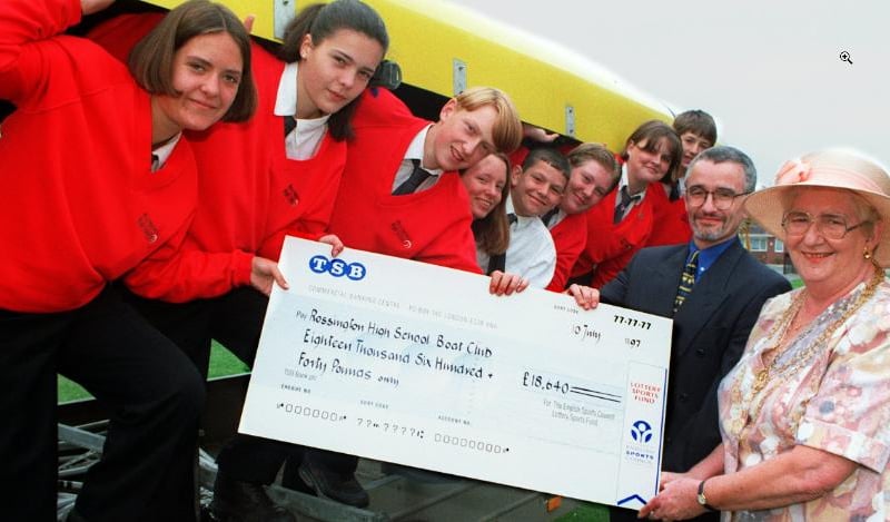 Pupils at Rossington High School were given a donation of £18,640 for sports equipment including the boat photographed. (Taken 1997). 
Mayor of Doncaster Shelia Mitchinson is handing the cheque over to pupils Nyssa Heppel, Kathyrn Slack, David Judd, Vicky Ullathorne, Graham Briggs, James Crockatt, Katie Whalley and Peter Utting.