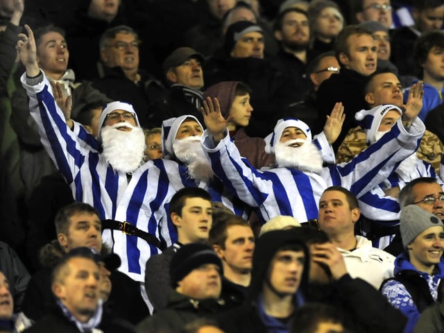 Festive Sheffield Wednesday fans get into the Christmas spirit at Oakwell in December 2012