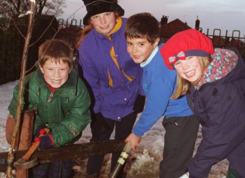 Alexander Michael, Jessica Brown, Christopher Michael and Harriet Brown from Ldygate School took part in a tree planting initiative in 1996