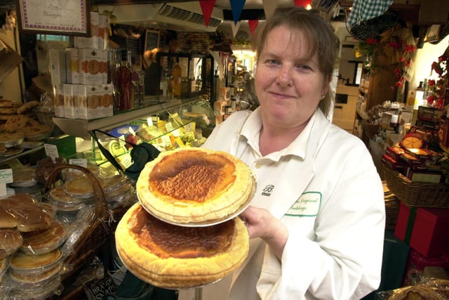Marion Wright with Bakewell puddings at Bloomers Origional Bakewell Pudding shop in 2002