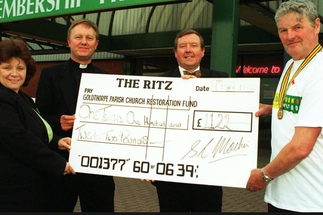 A cheque for £1,122 was presented to the Goldthorpe Parish Church restoration  fund from Ritz Bingo in 1997