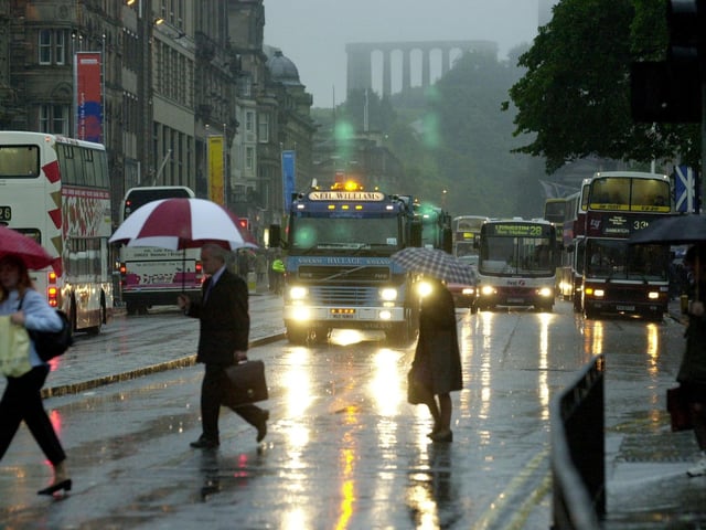 Lorries drove slowly through central Edinburgh in protest to the tax on fuel, 11 September 2000.