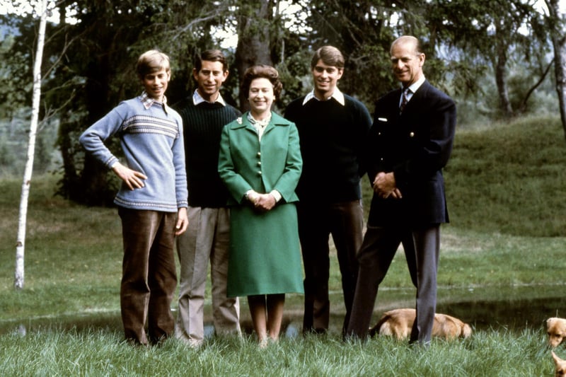 Picture of Queen Elizabeth and Duke of Edinburgh (R) posing with theirs three sons, Charles, Edward (L), Andrew (2ndR) and the royal corgies for their 32nd wedding anniversary, in Balmoral Castle, Scotland, 20 November 1979.
