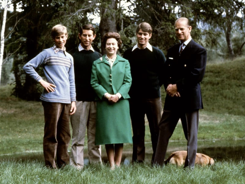 Picture of Queen Elizabeth and Duke of Edinburgh (R) posing with theirs three sons, Charles, Edward (L), Andrew (2ndR) and the royal corgies for their 32nd wedding anniversary, in Balmoral Castle, Scotland, 20 November 1979.