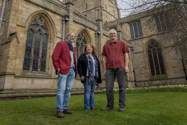 Martin, Mary and Peter in front of the crooked spire