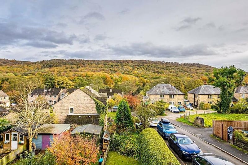 Here's the street on which the property sits, seen within the Peak District landscape. There has previously been planning permission granted to create an off street parking space at the end of the cottage's garden which would have access from Derwent Close.
